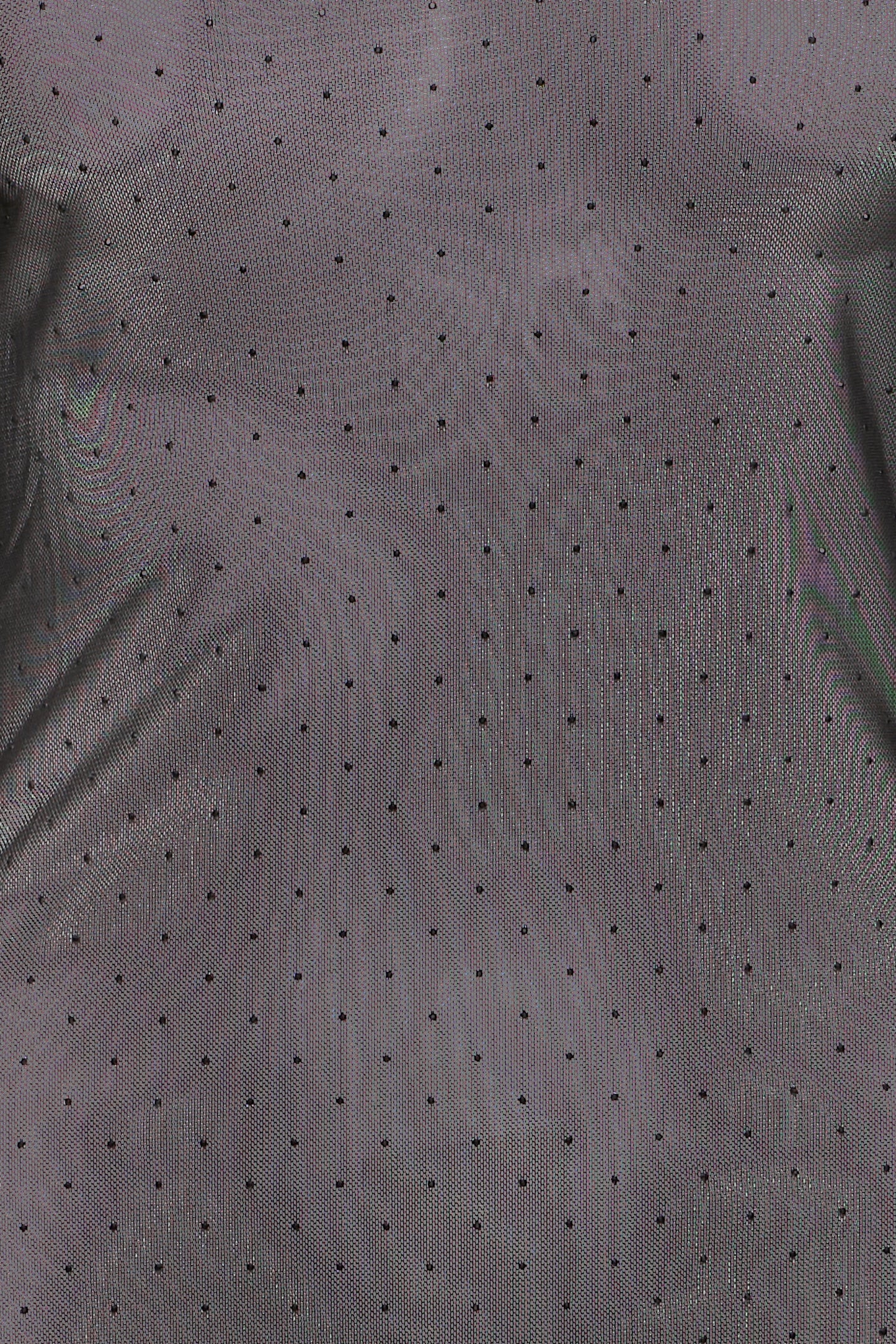 Close-up of a gray fabric with small black dots