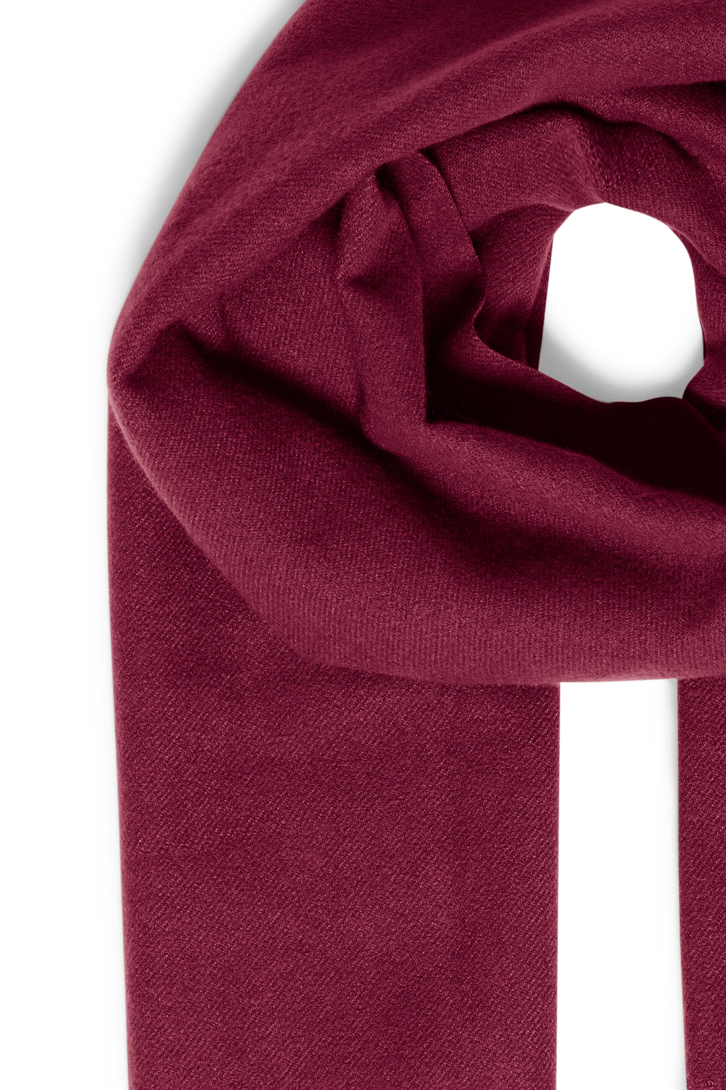 Close-up of a burgundy fabric roll on a white background