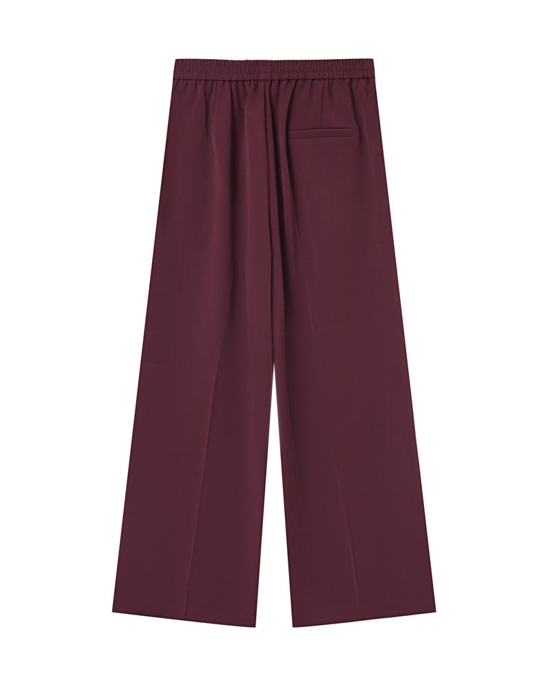 Maroon wide-leg pants on a white background