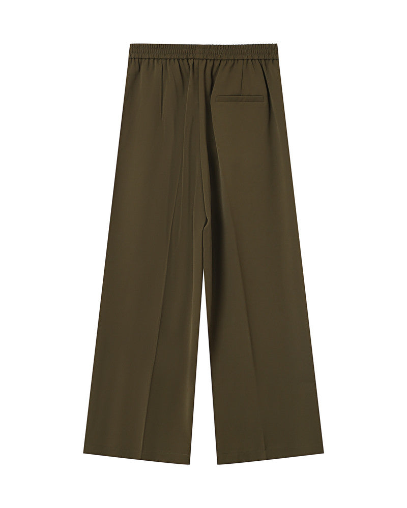 green wide-leg pants on a white background