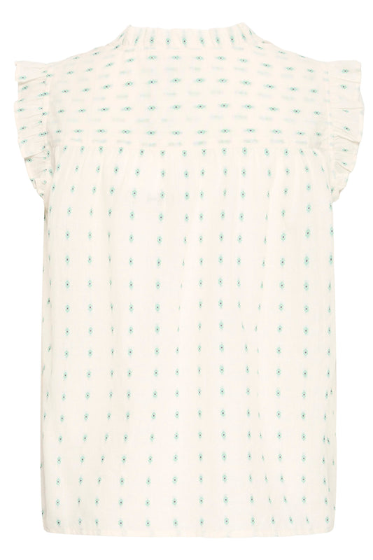 White sleeveless top with small green pattern on a white background