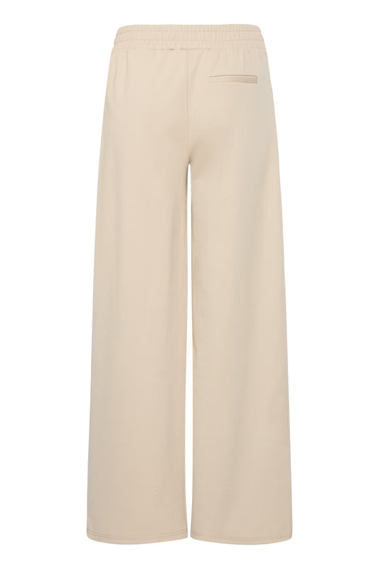 Beige wide-leg pants on a white background