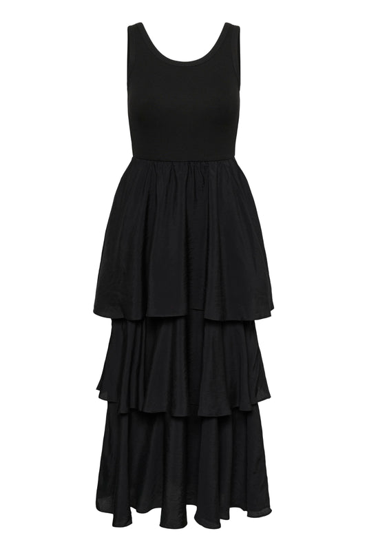Black tiered dress on a white background