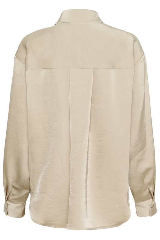 Beige shirt on a white background