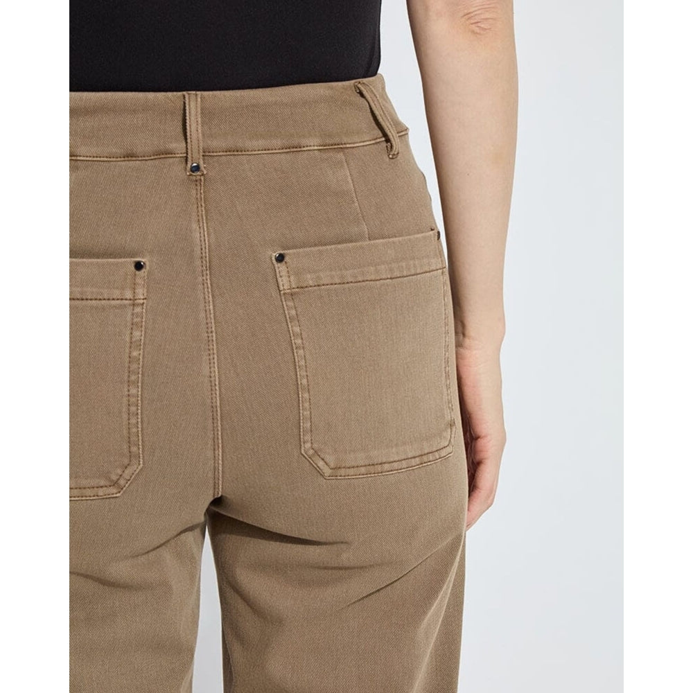 Brown pants worn by a person on a white background