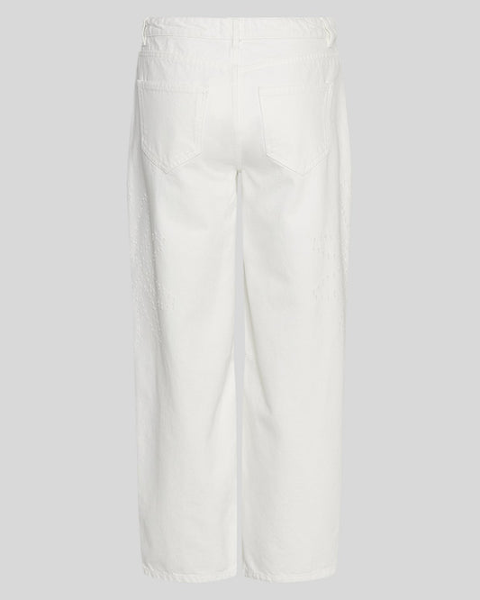 White pants on a light gray background