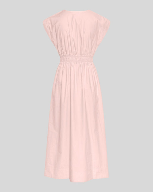 Pink dress on a light gray background