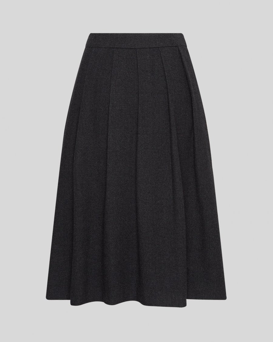 Dark gray skirt on a light gray background