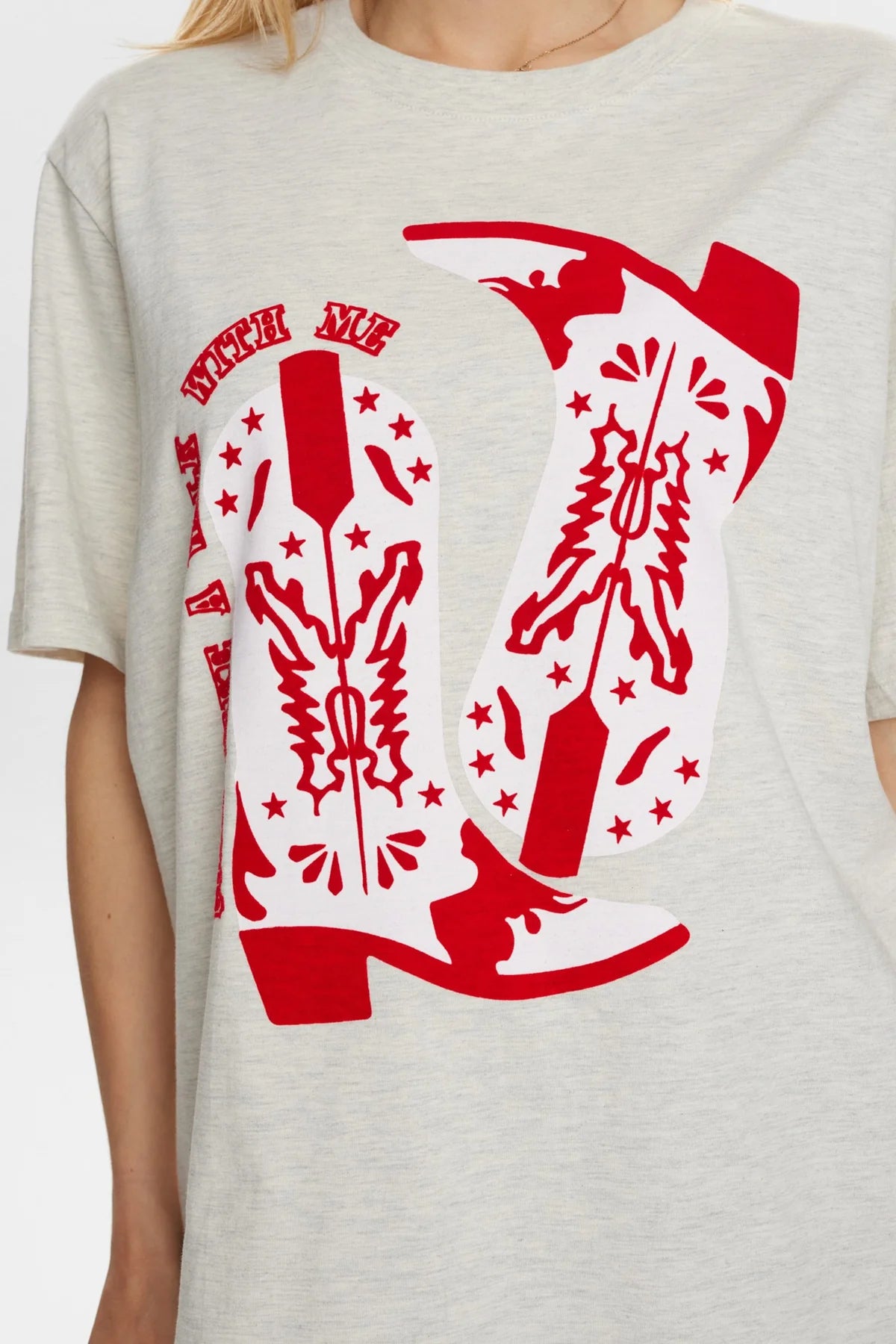 Gray t-shirt with red graphic design of cowboy boots and text on a white background