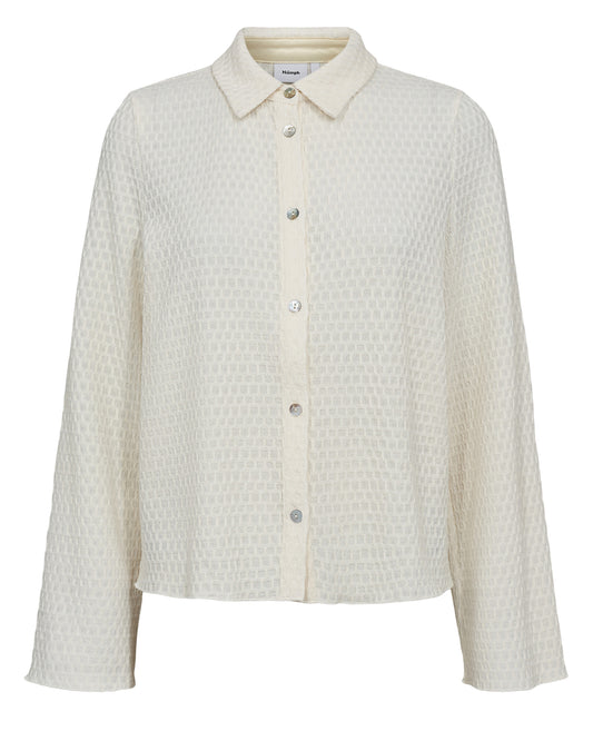 Light beige textured shirt with collar on a white background