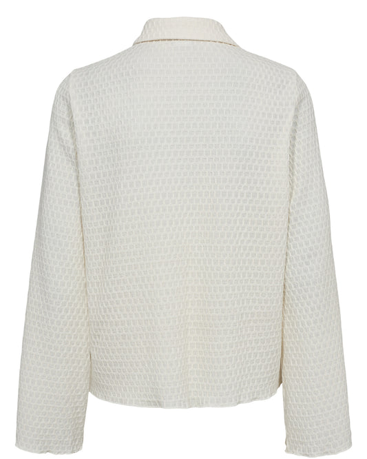 White textured shirt on a white background