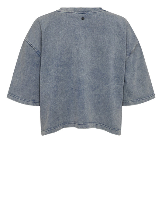 Blue denim shirt on a white background