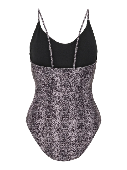One-piece swimsuit with black top and patterned skirt on a white background