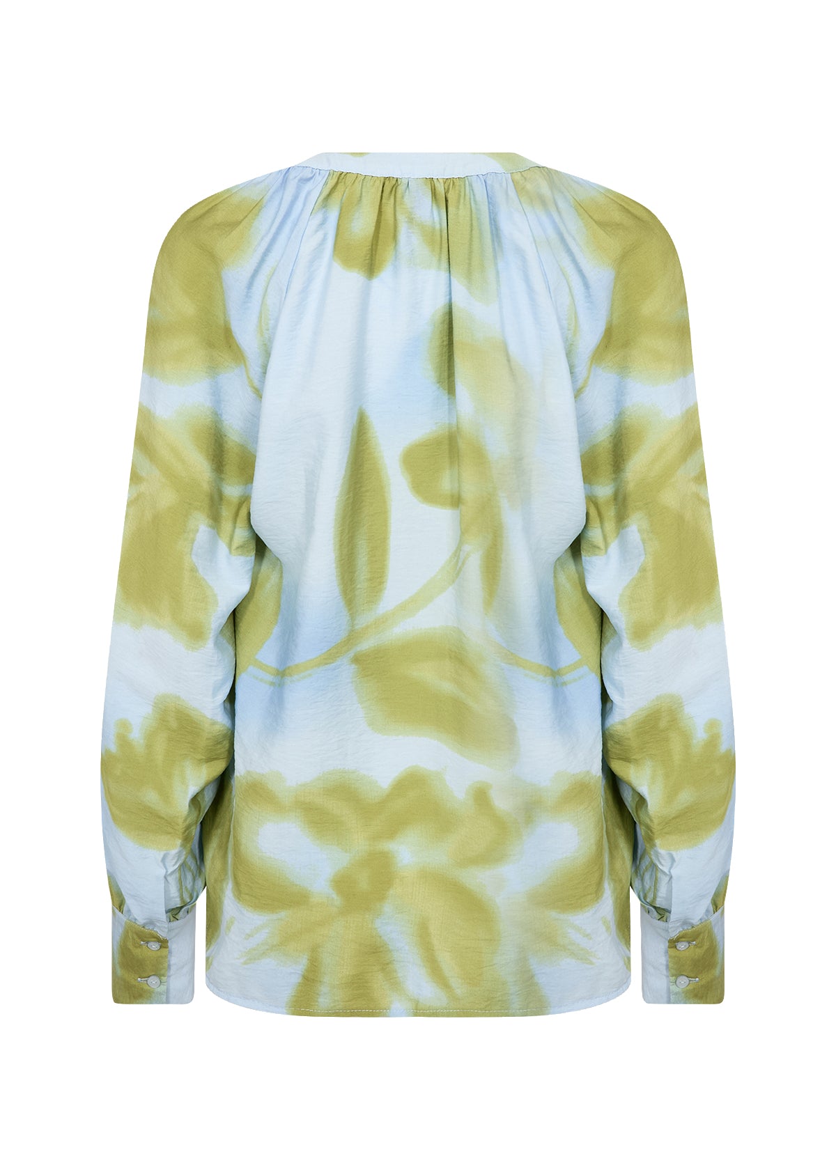 Yellow and white floral patterned blouse on a white background