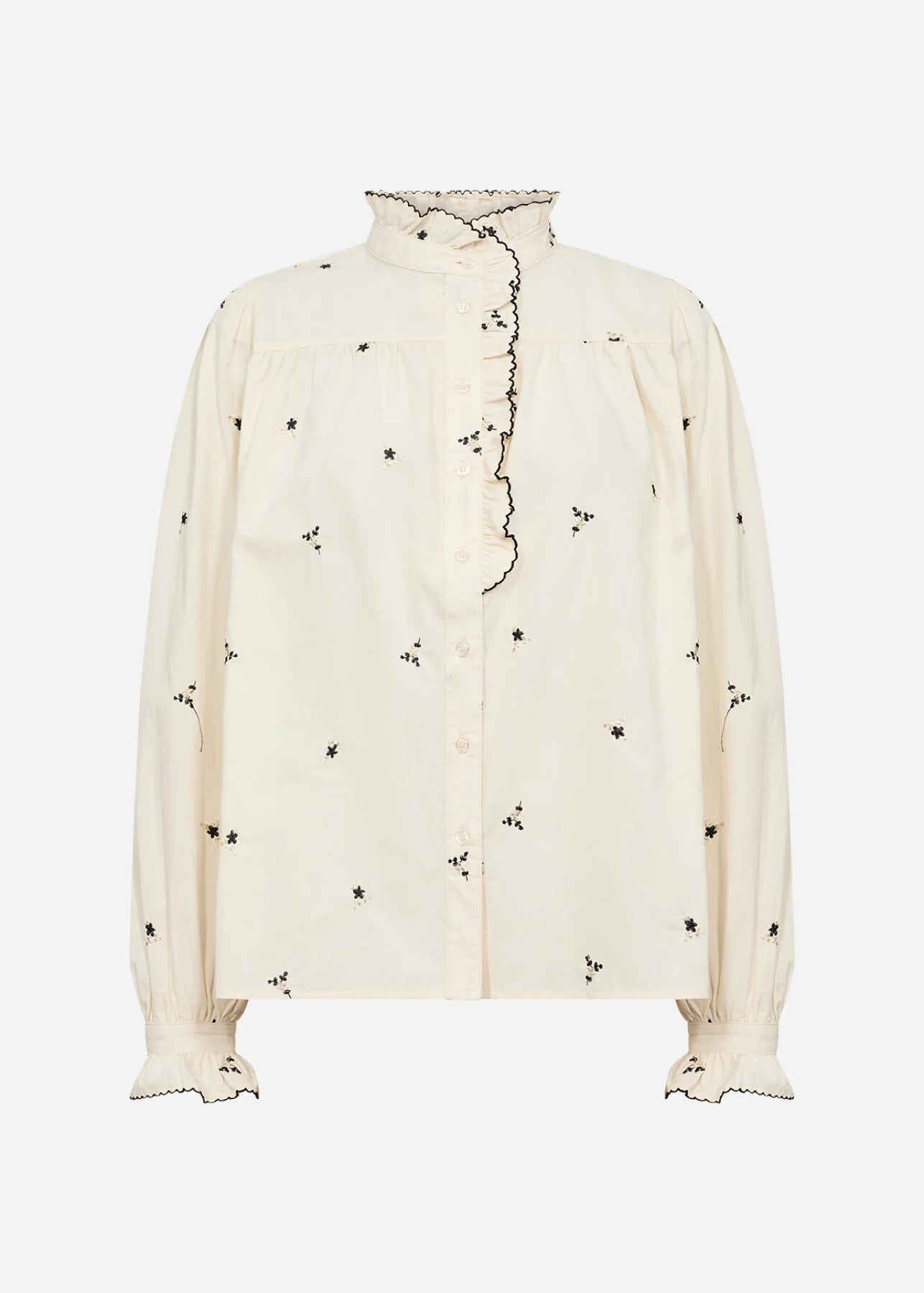 White blouse with black floral pattern on a white background