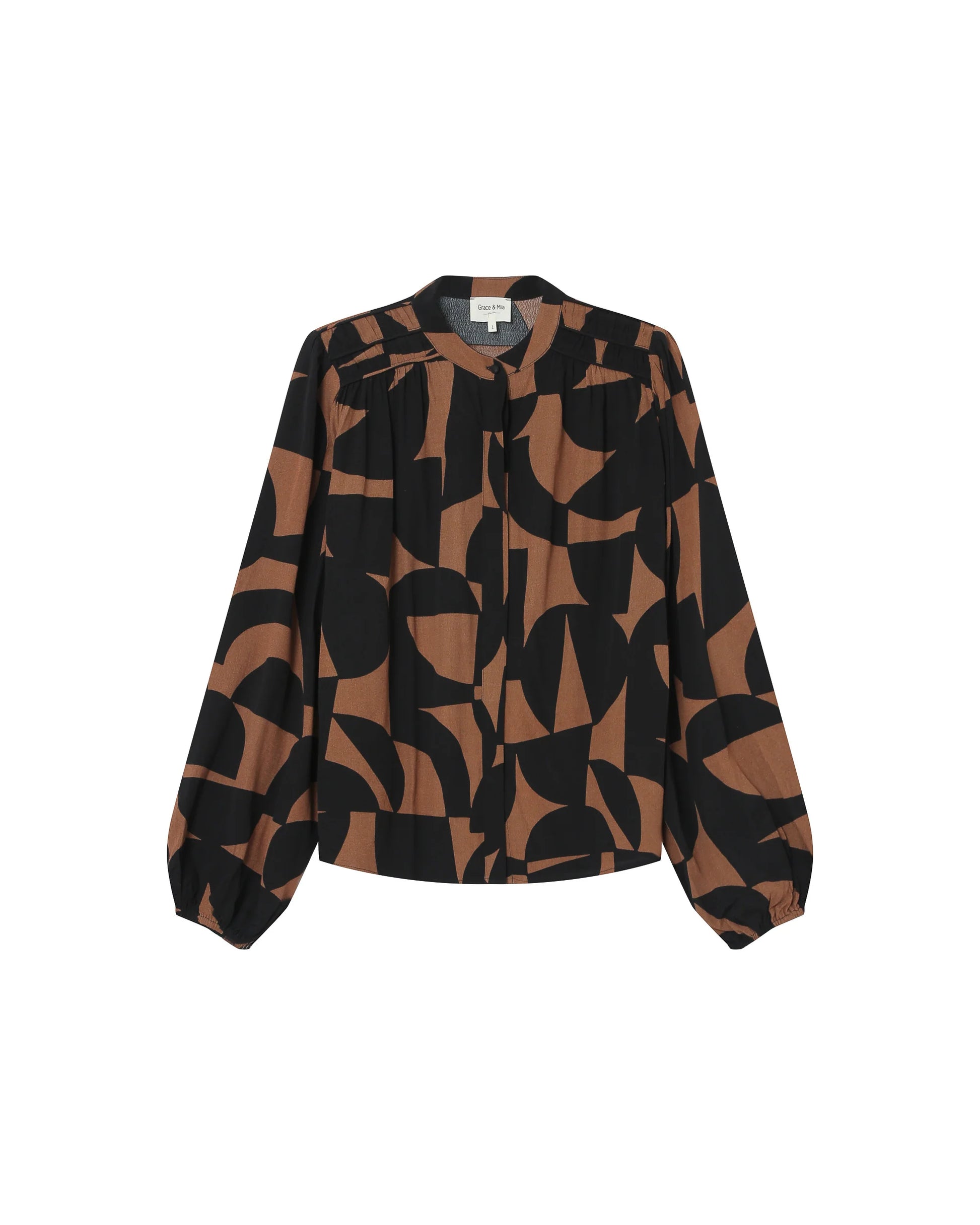 Black and brown patterned blouse on a white background