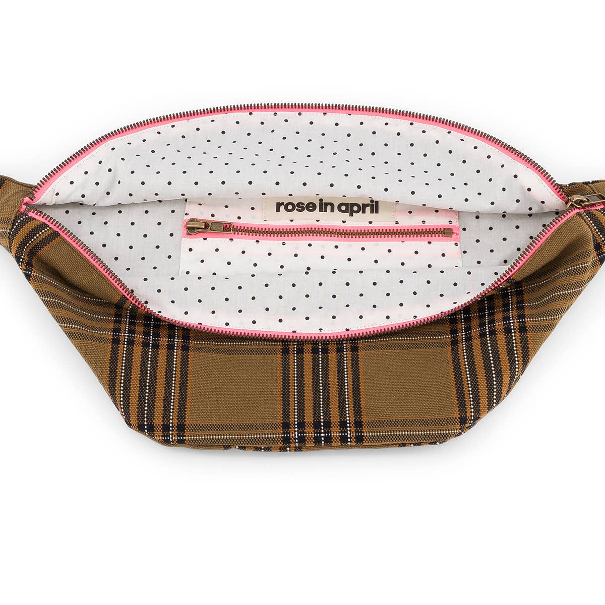 Fanny pack with plaid pattern and polka dot interior on a white background