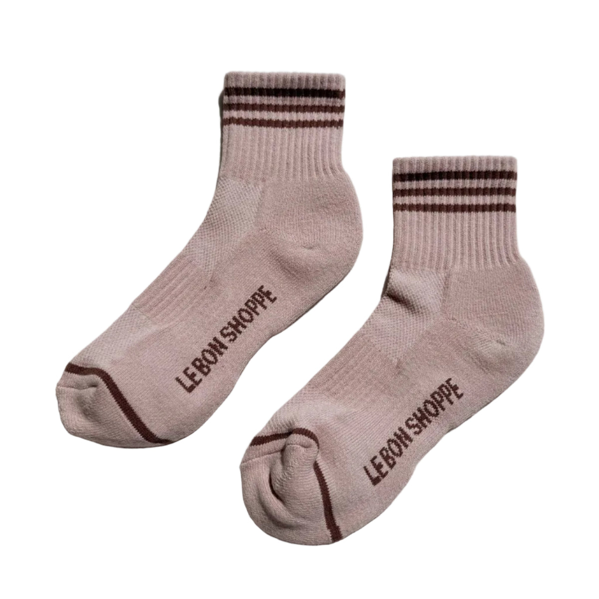 Pair of pink socks with brown stripes and 'LEBON SHOPPE' branding on a light gray background