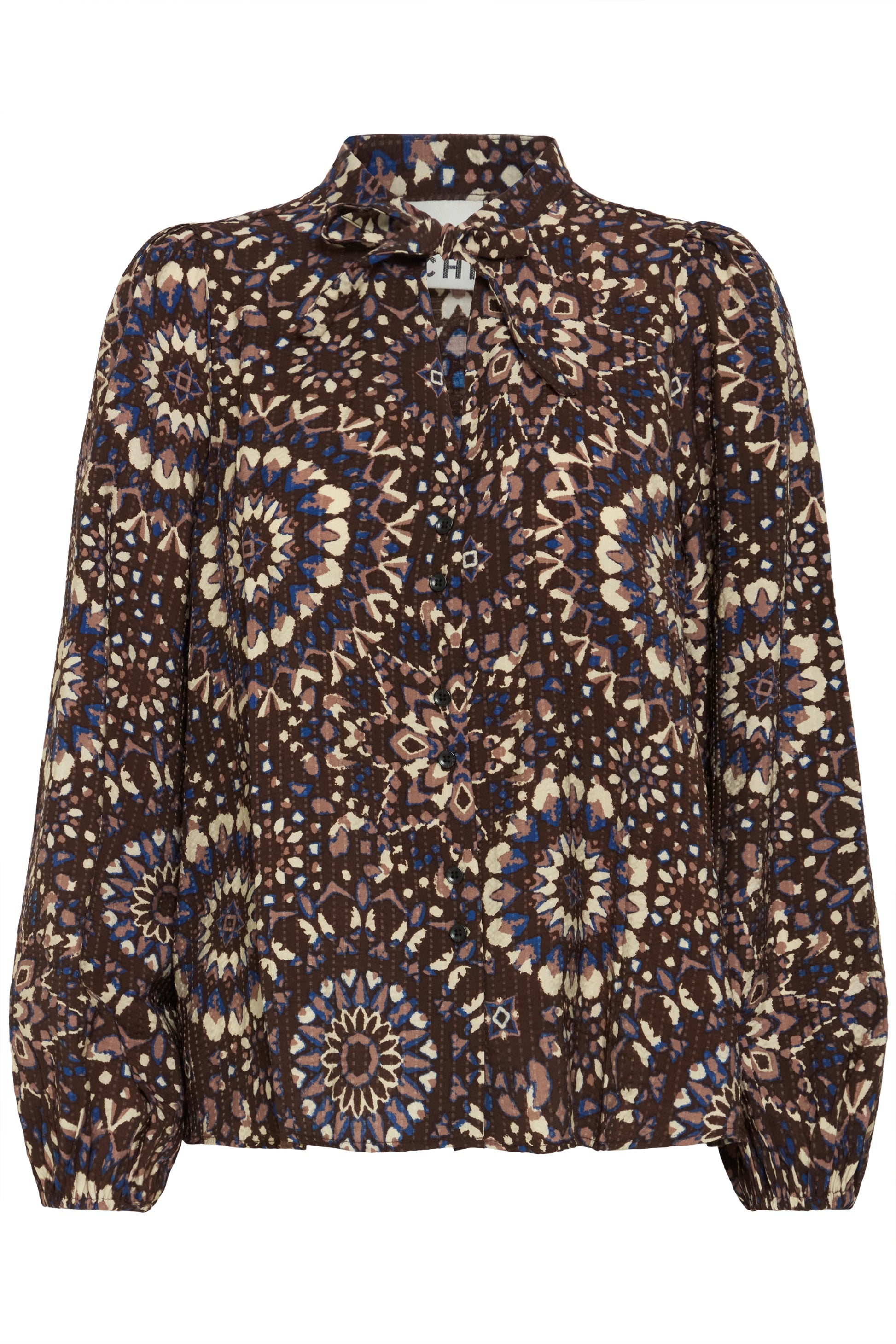 Floral patterned blouse on a white background