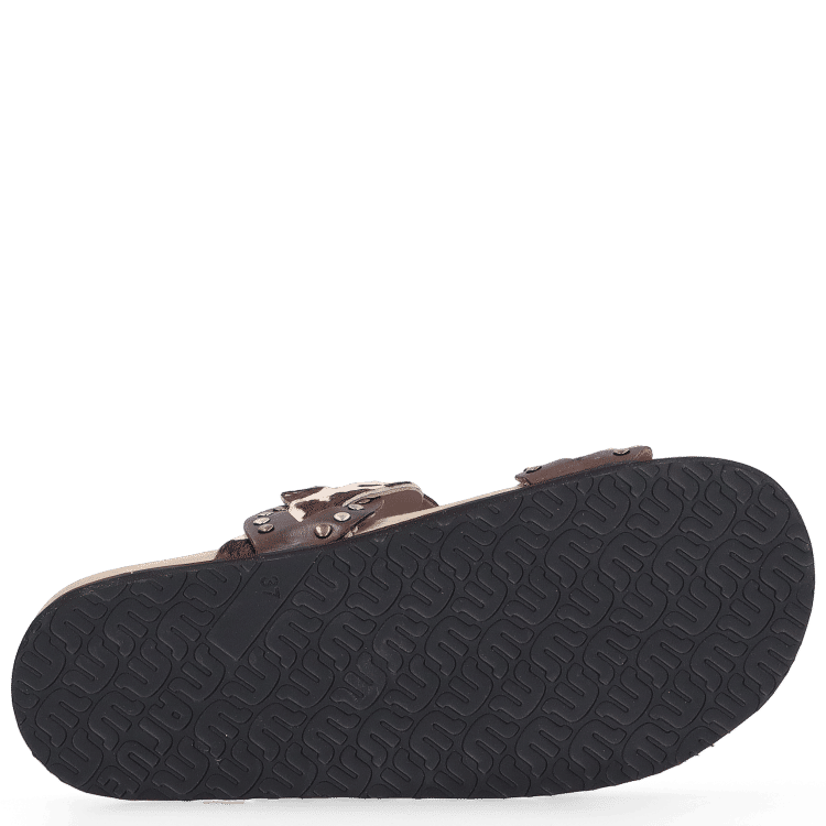 Black sandal with a textured sole on a white background
