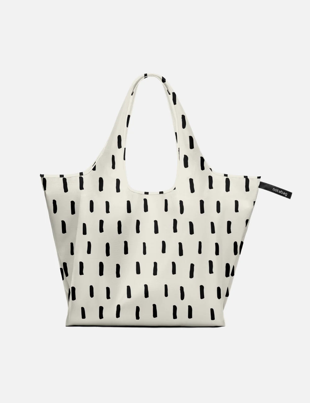 White tote bag with black pattern on a white background