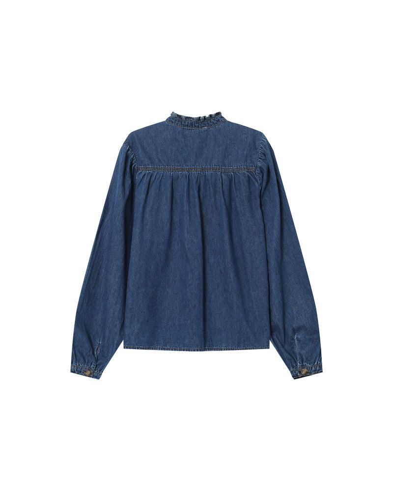 Blue denim blouse on a white background