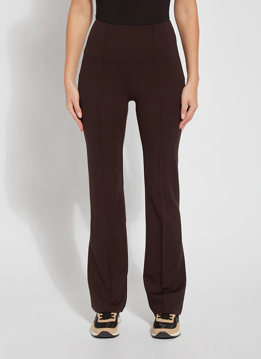 Brown pants worn by a person on a white background
