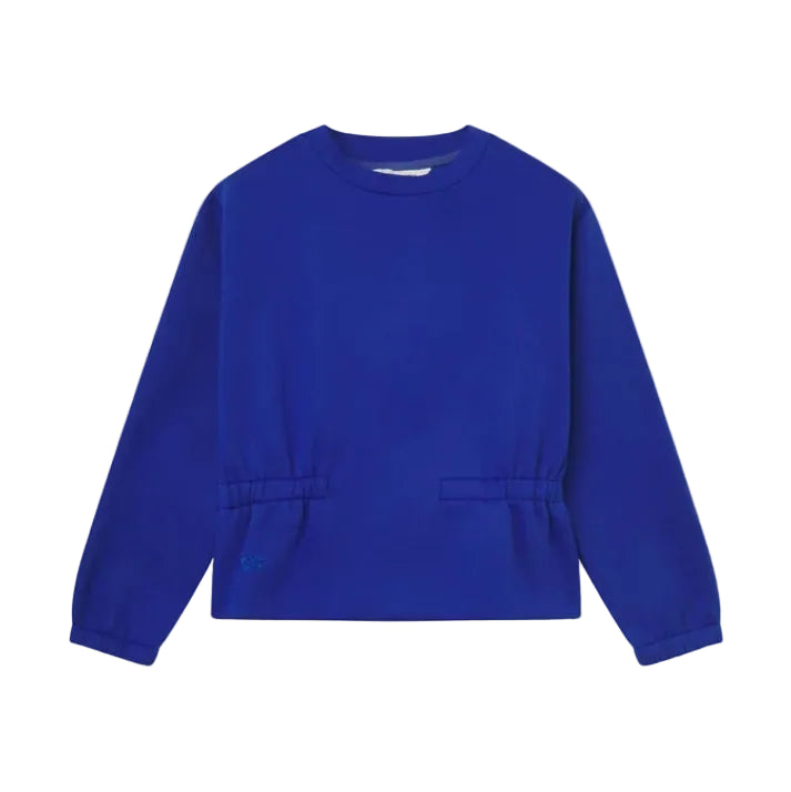 A vibrant royal blue long-sleeve crewneck sweatshirt with drawstring waist details and front pockets, displayed flat against a light off-white background.