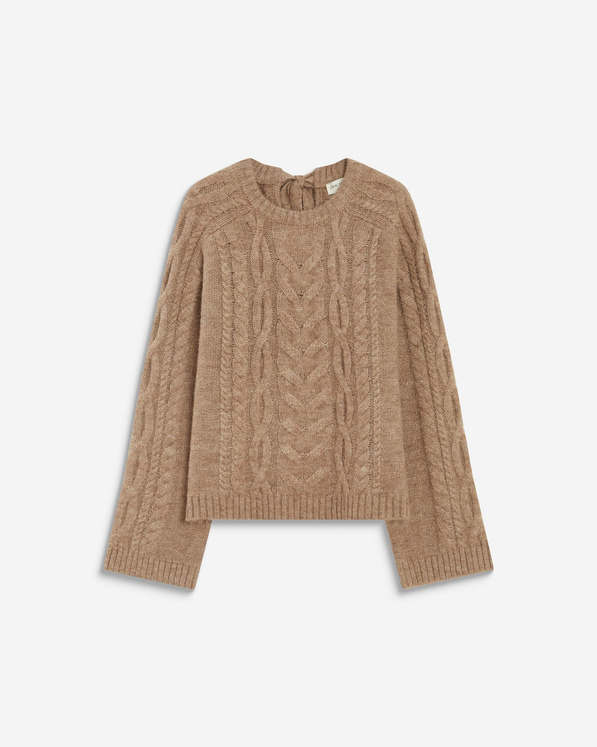 A cropped cable-knit sweater in a warm camel brown color, displayed flat against a clean off-white background.