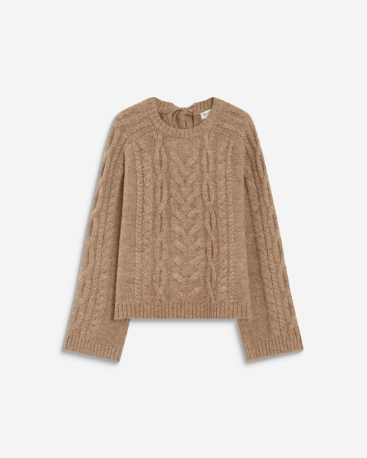 A cropped cable-knit sweater in a warm camel brown color, displayed flat against a clean off-white background.
