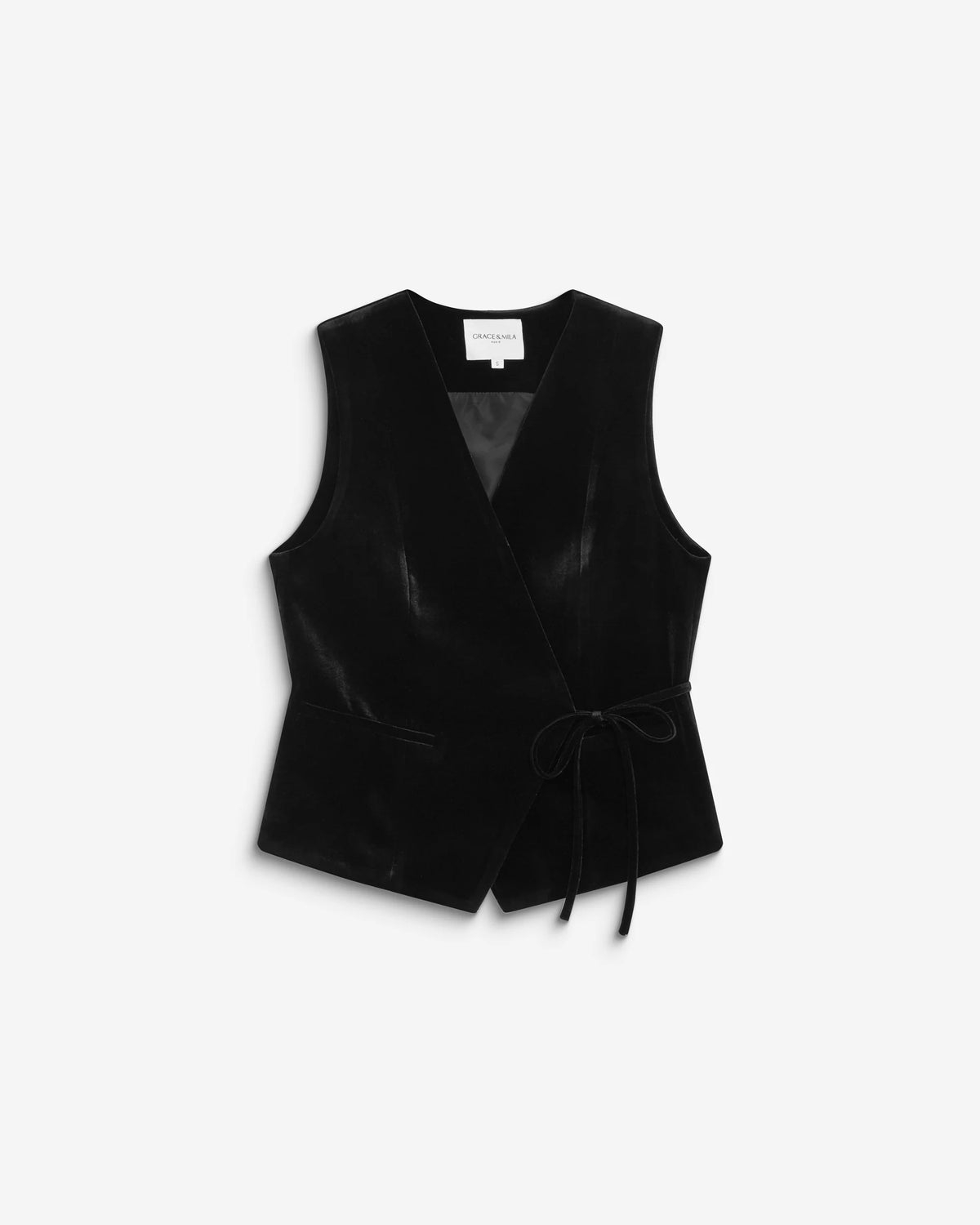 A black velvet wrap vest with a tie waist and front pockets, displayed flat against a light gray background.