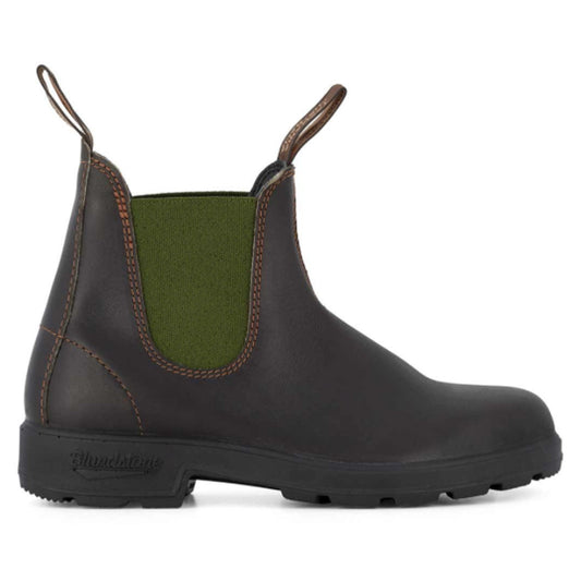 Black Chelsea boot with green lining on a white background