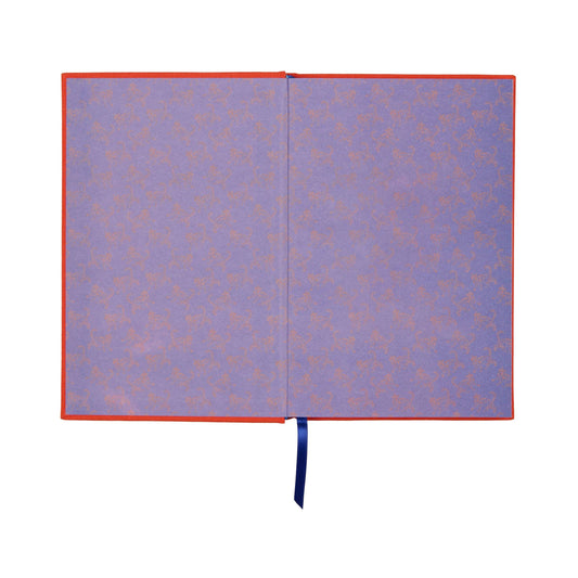 Open book with purple and red pattern on a white background