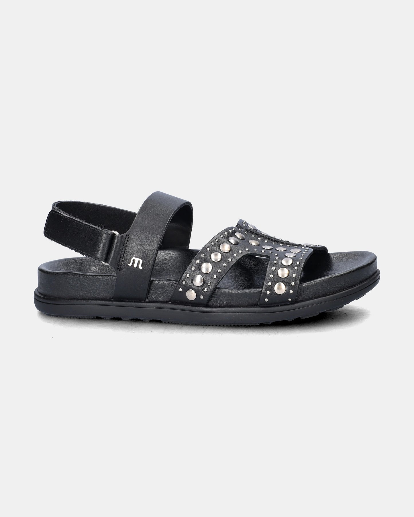 black sandal with silver studs on a white background
