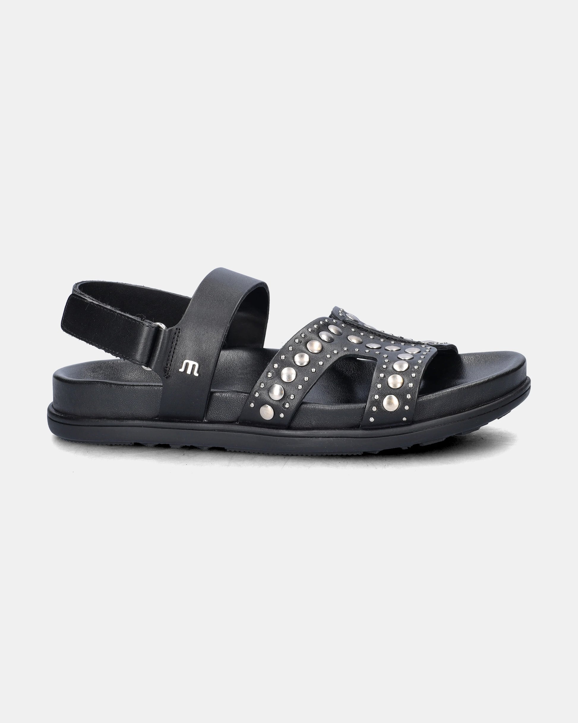 black sandal with silver studs on a white background