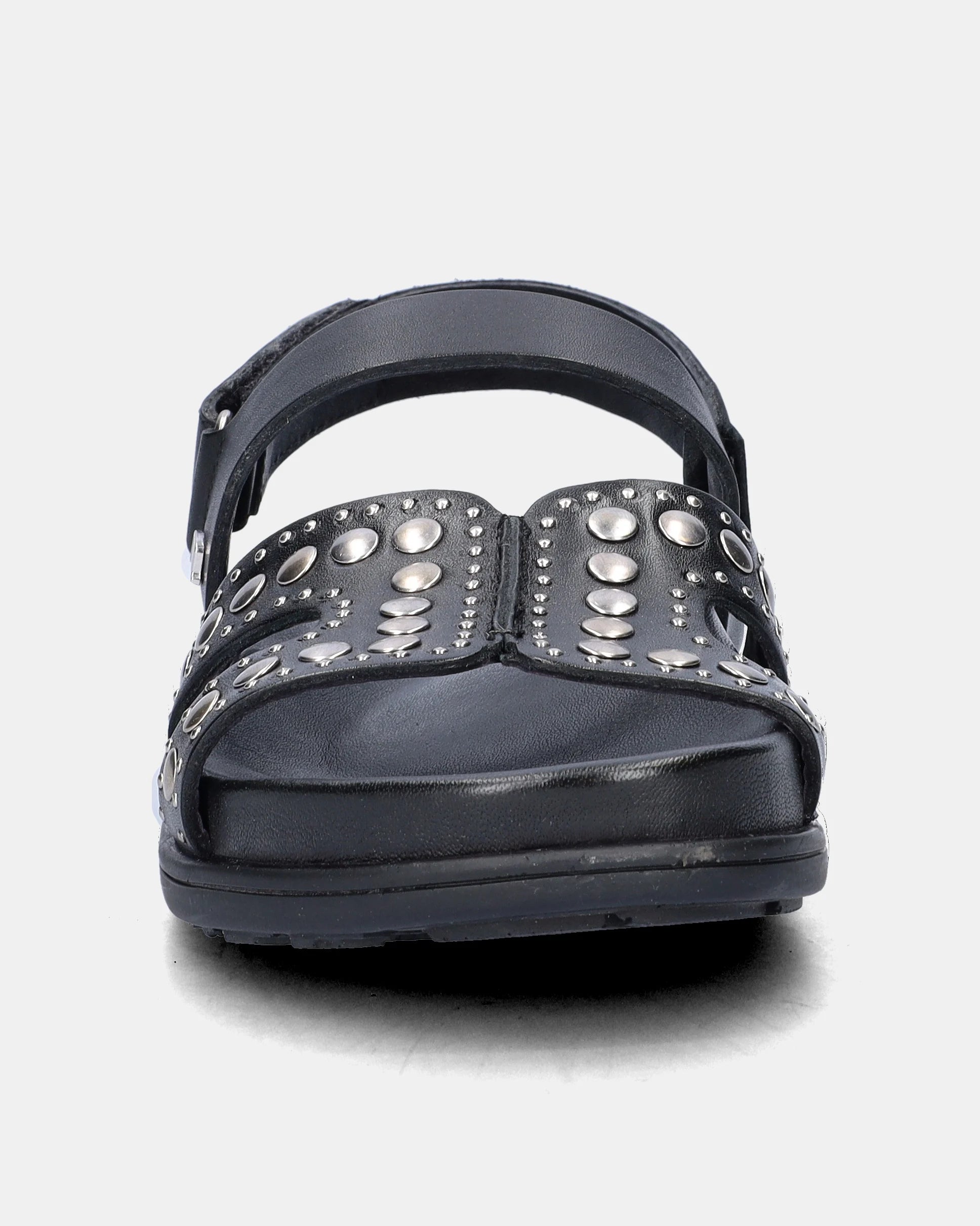 black sandal with silver studs on a white background