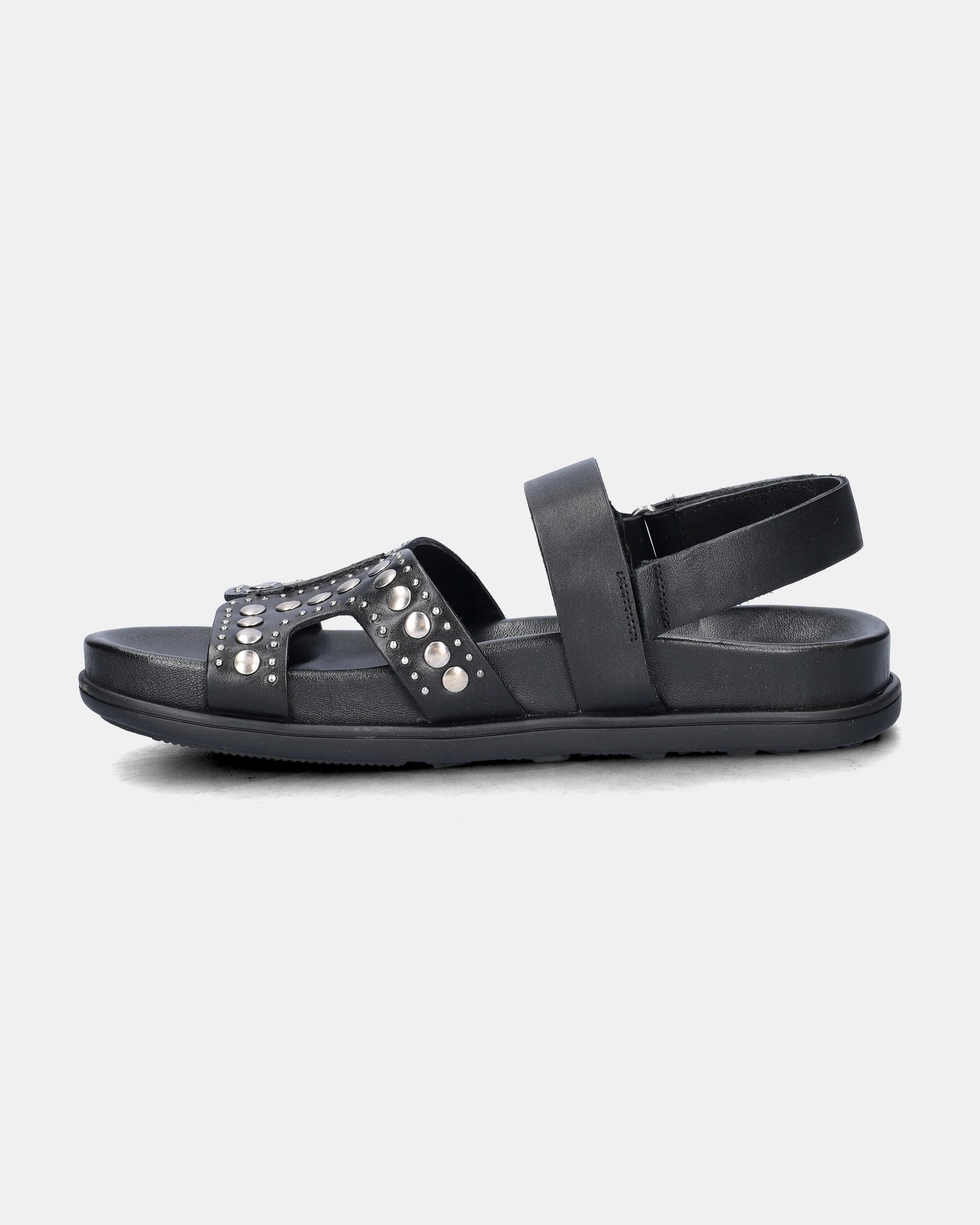 black sandal with silver studs on a white background