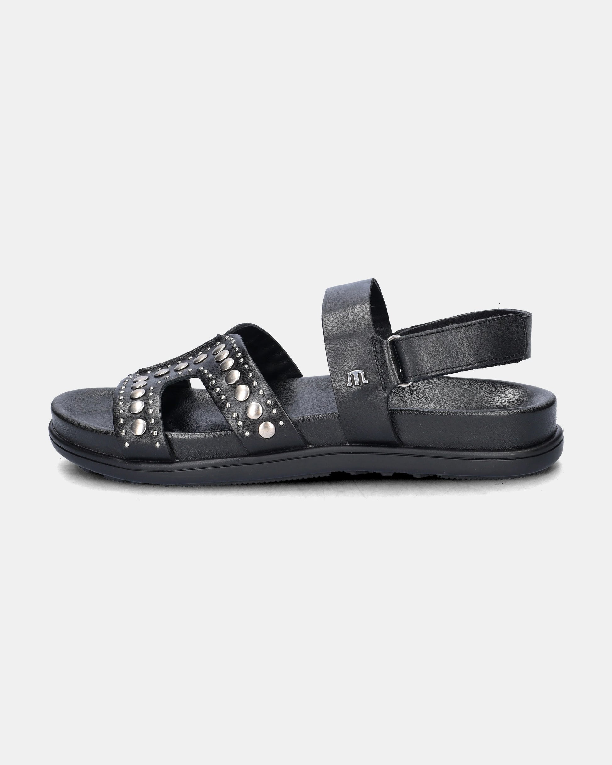 black sandal with silver studs on a white background