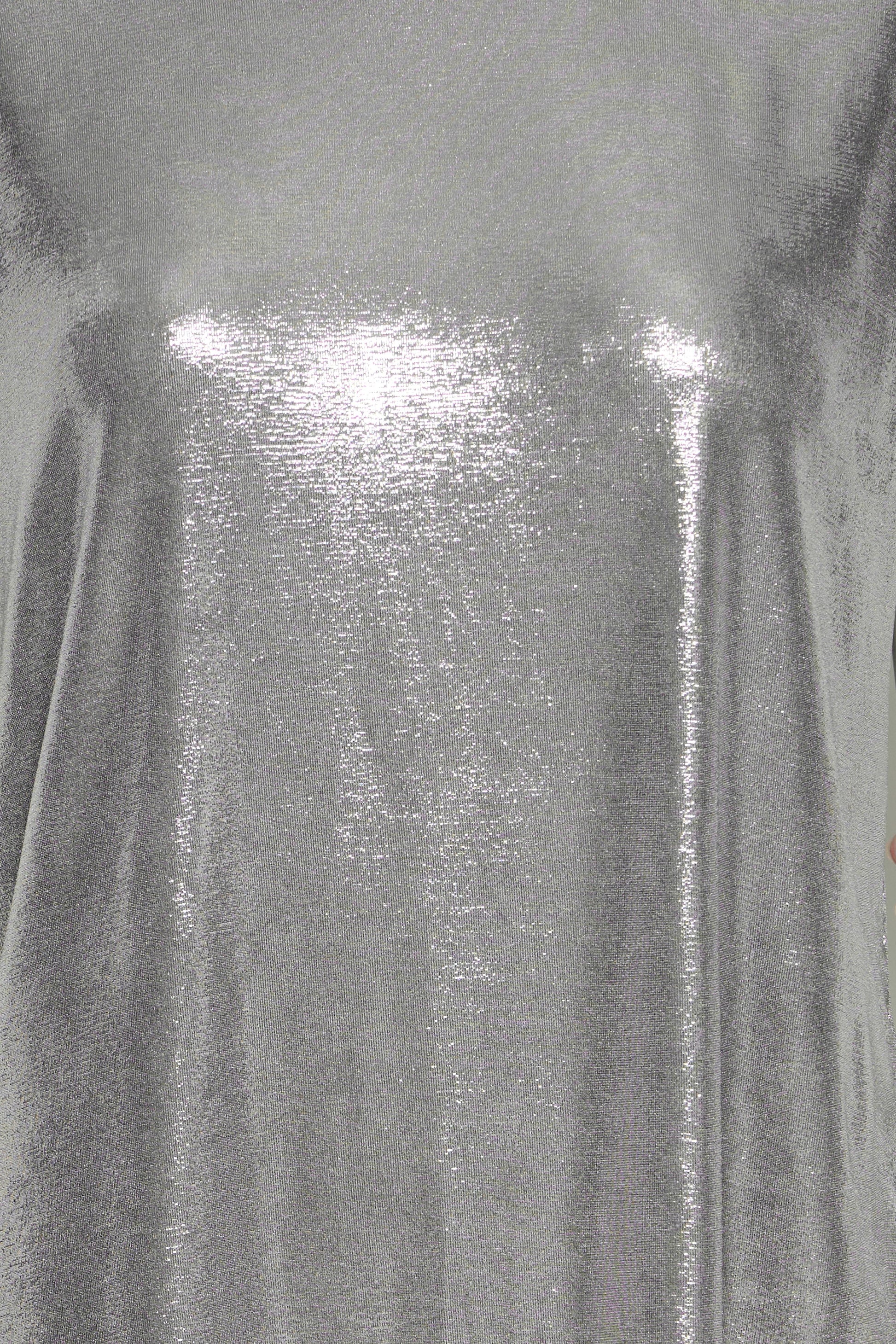 Close-up of a shiny silver fabric texture