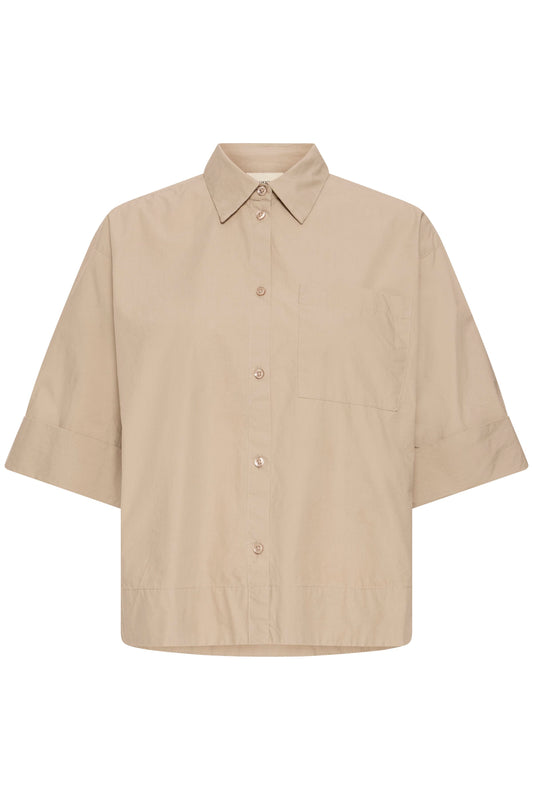 Beige shirt on a white background