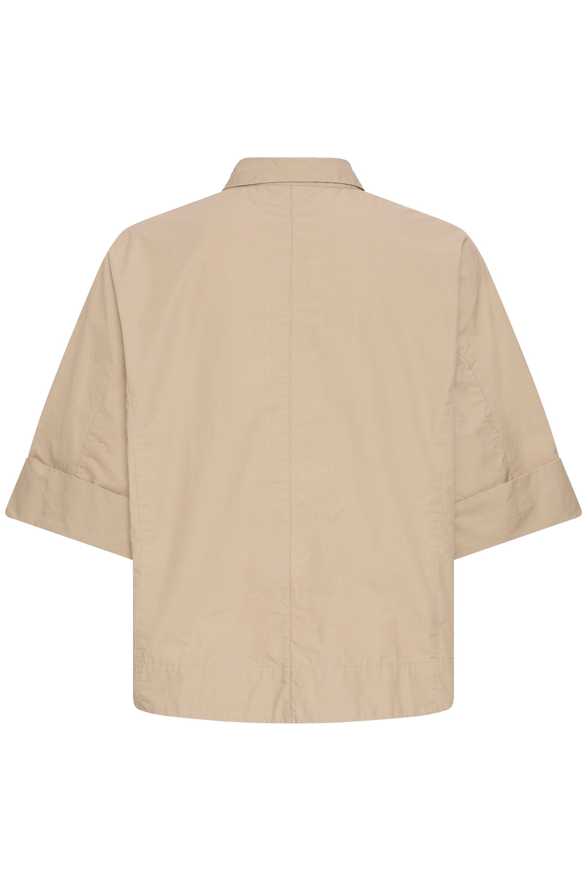 Beige shirt on a white background