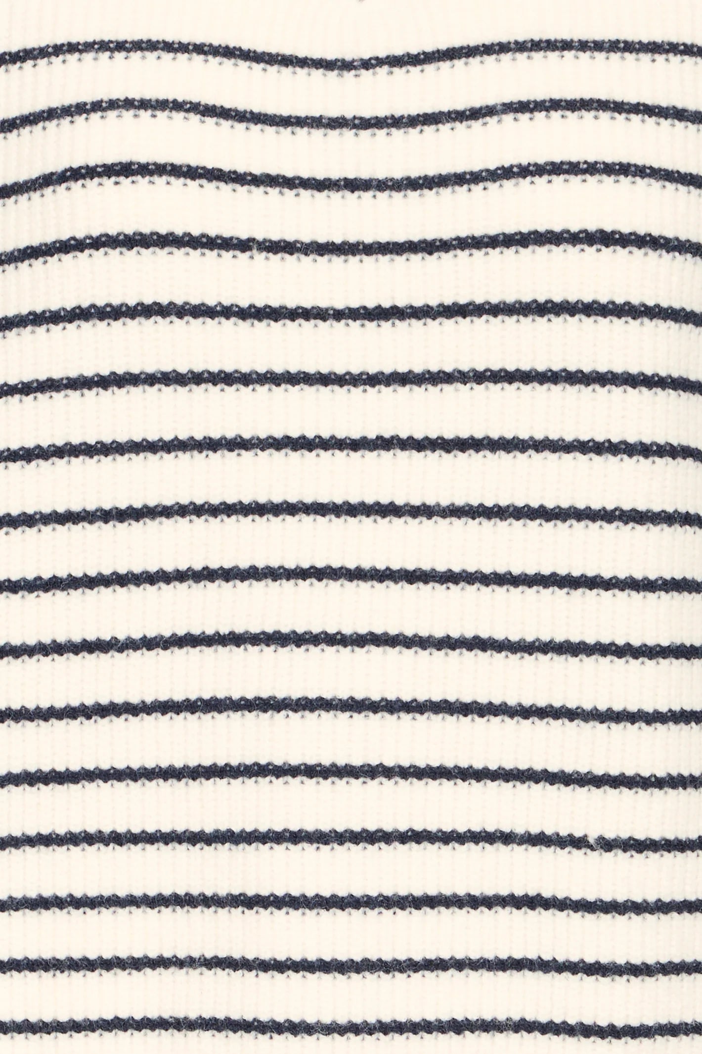 Close-up of a fabric with blue and white horizontal stripes.