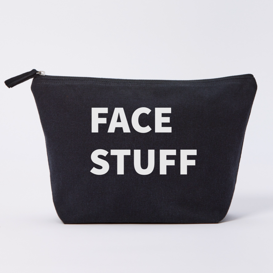 Black pouch with 'FACE STUFF' text on a white background