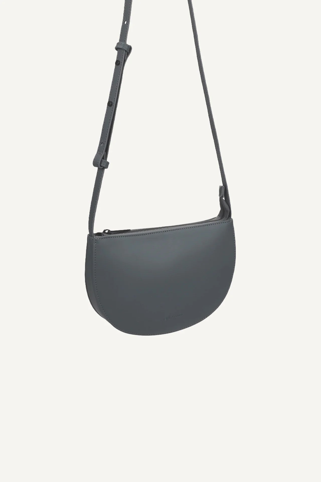 blue grey handbag on a white background