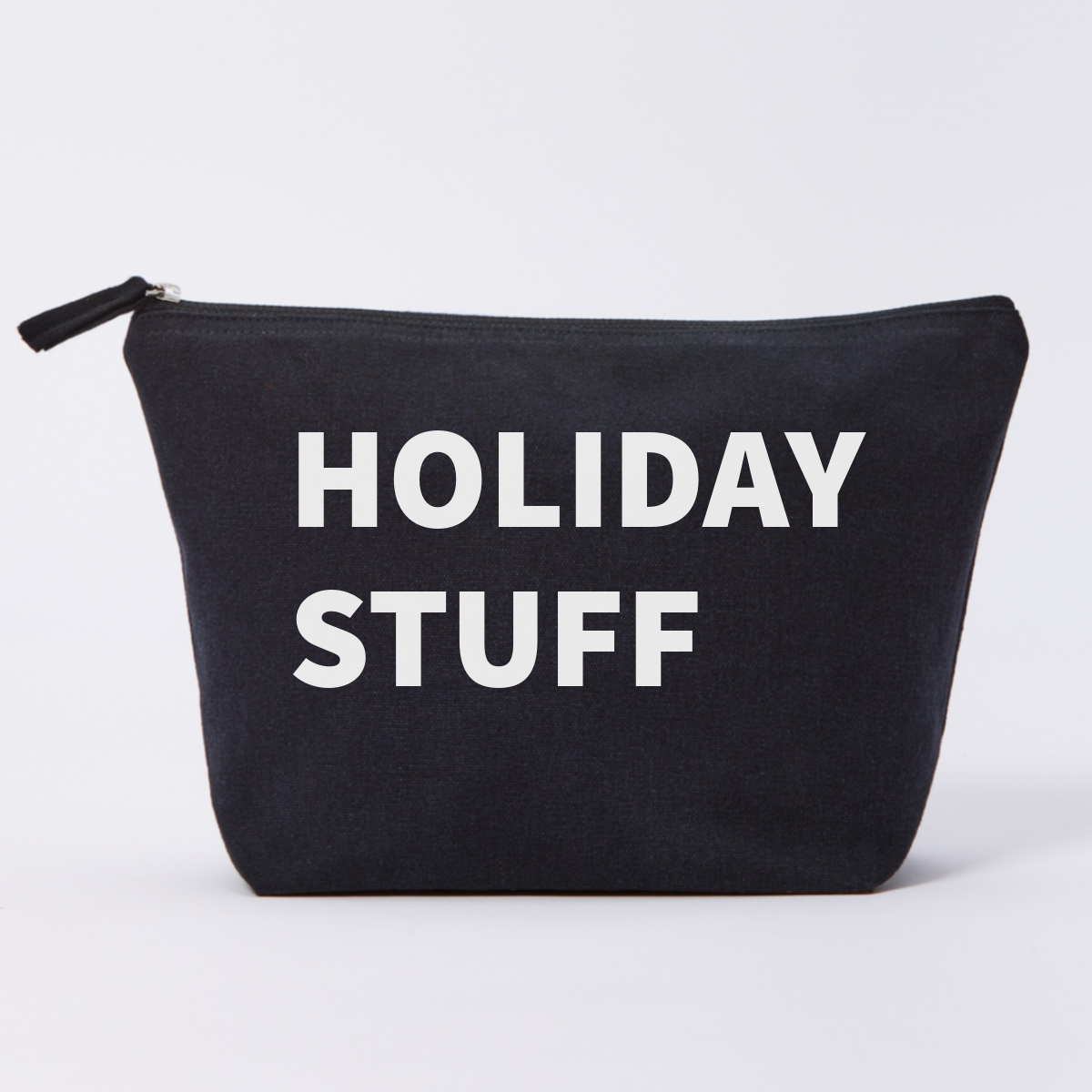 Black pouch with 'HOLIDAY STUFF' text on a white background