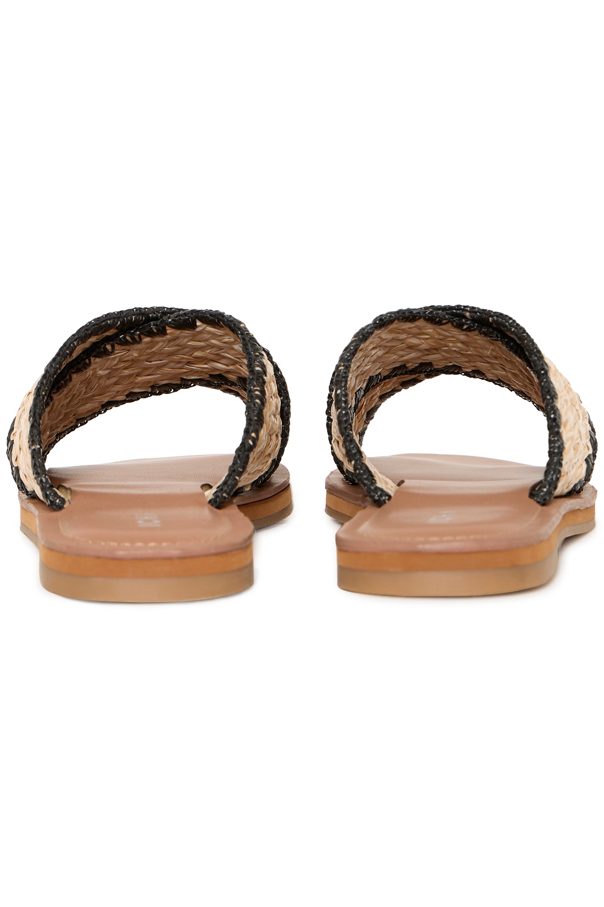 Pair of sandals with woven straps on a white background