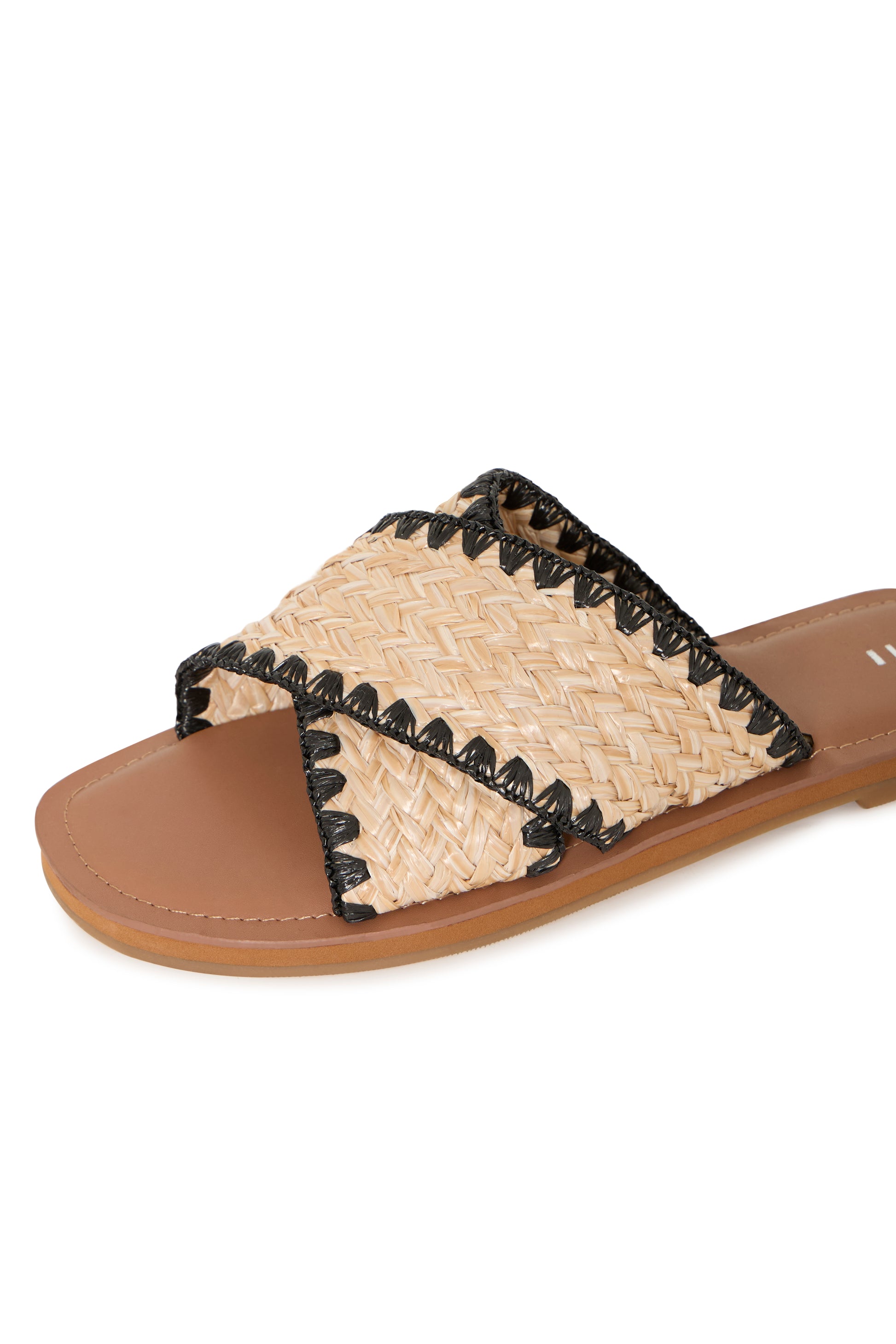 Woven sandal with black accents on a white background