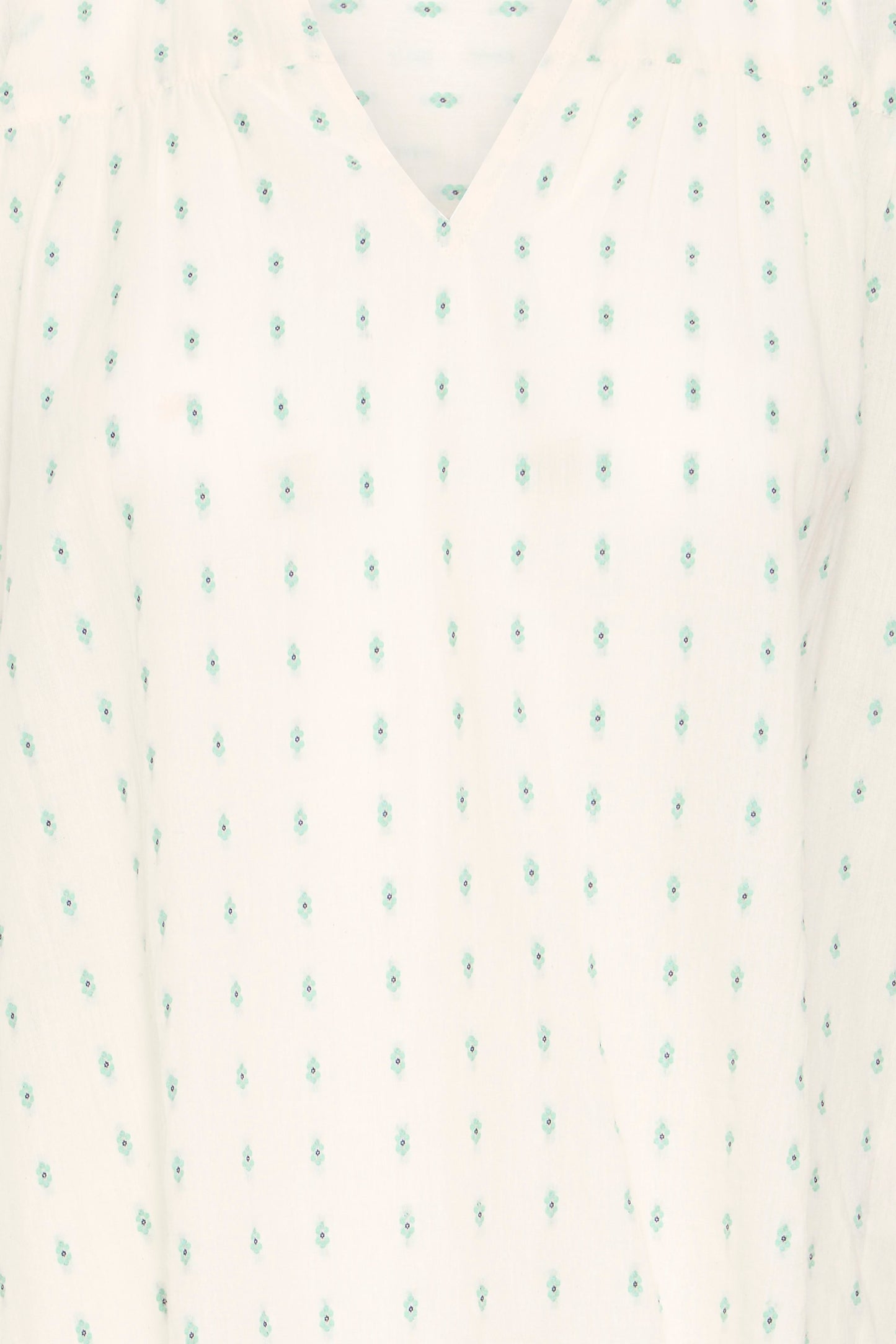 Close-up of a white fabric with a subtle pattern on a white background
