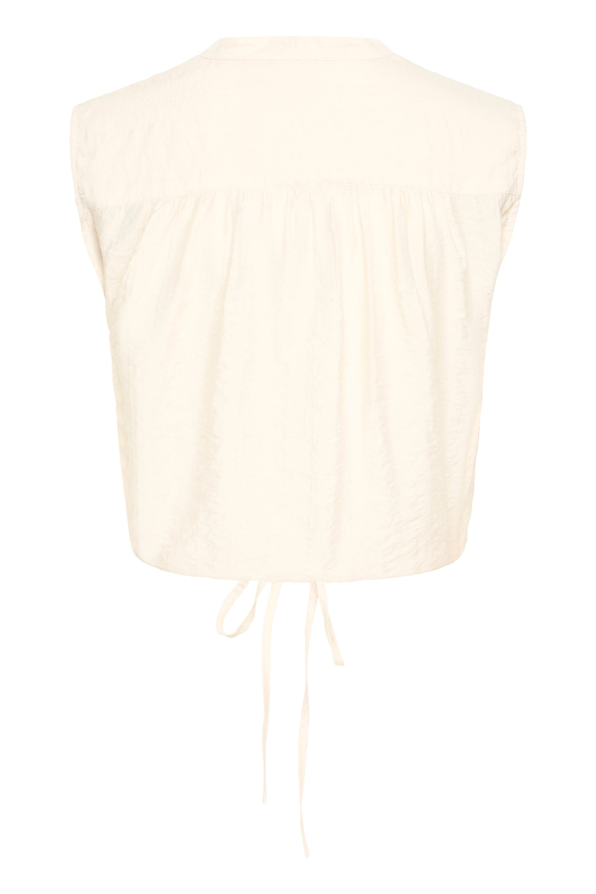 Cream-colored sleeveless top on a white background