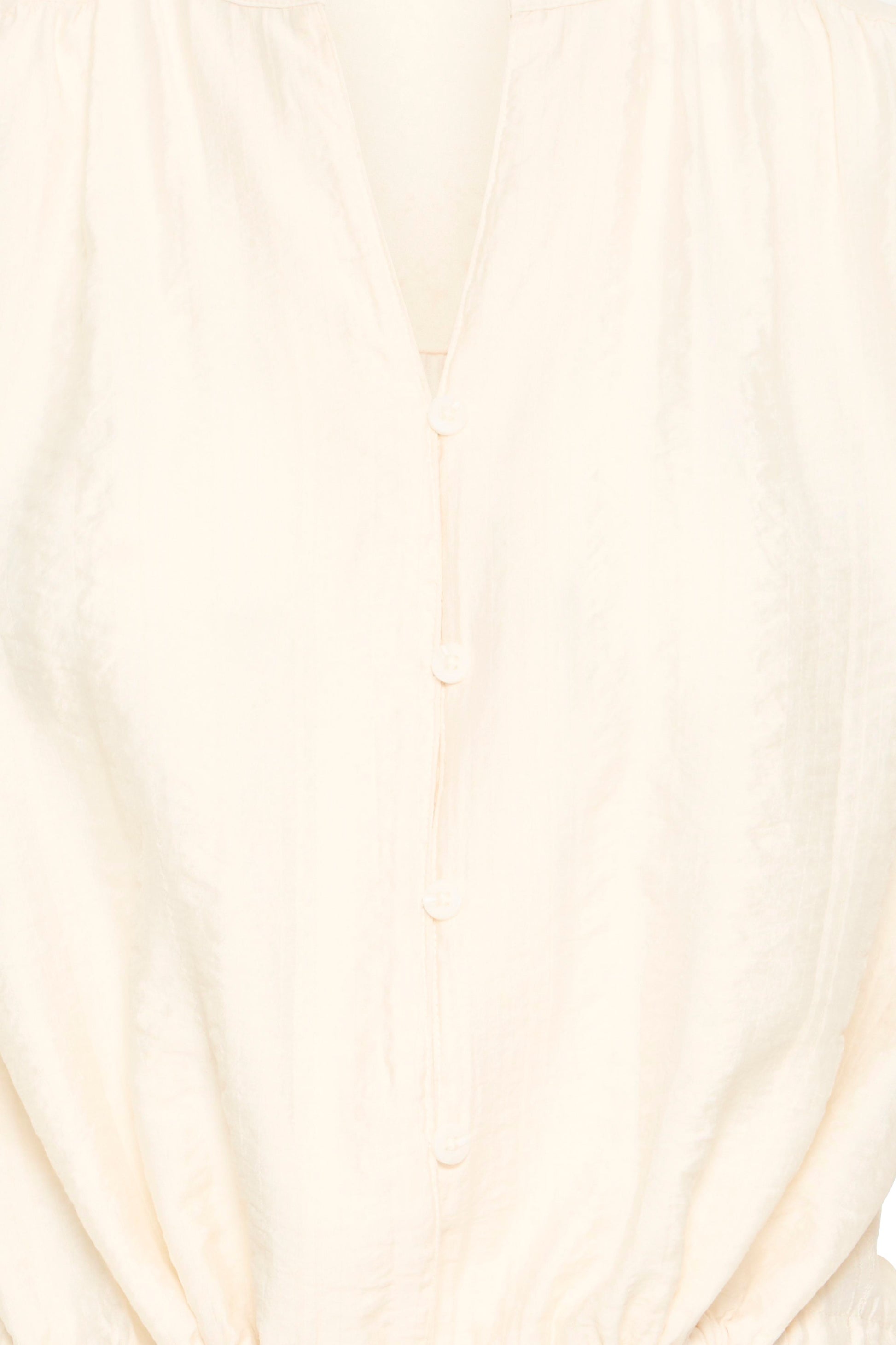 Close-up of a textured cream fabric